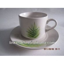 Haonai экспортировала керамическую чашку с зеленой травой и блюдце